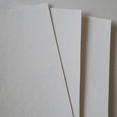 3M&trade; CeQUIN II - several overlapping sheets of white inorganic electrical insulation paper.